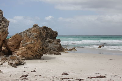 Scenic view of beach against sky