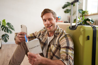 Young man using mobile phone