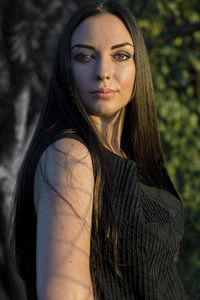 Portrait of woman standing outdoors