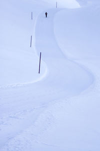 Alpine landscape in winter at alpe d'huez with the mountains covered in snow