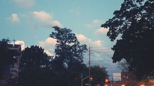 Low angle view of building against cloudy sky