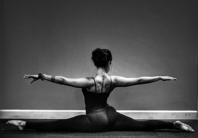 Woman doing yoga in studio