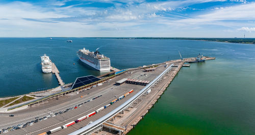 Large port in estonia, tallinn with many cruise ships docked including large msc cruise