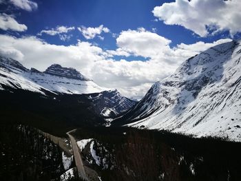 Scenic view of snowcapped mountains against sky