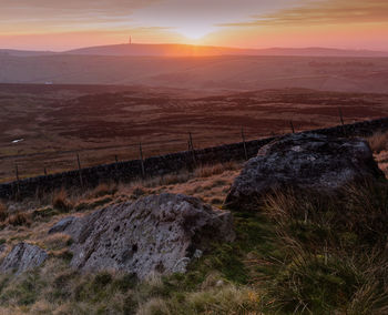 Scenic view of landscape during sunset