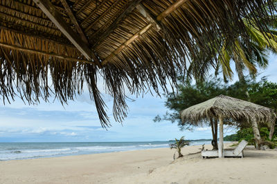 Beautiful panoramic landscape with white sand and blue sky from the beach huts 