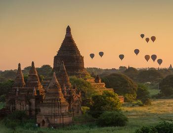 Temple against sky during sunset