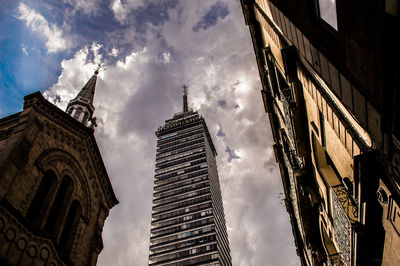 Low angle view of buildings in city against sky