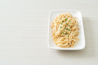 High angle view of noodles in plate on table