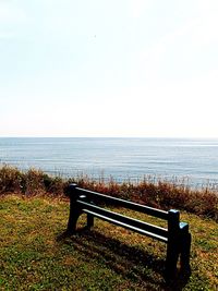 Scenic view of calm sea against clear sky