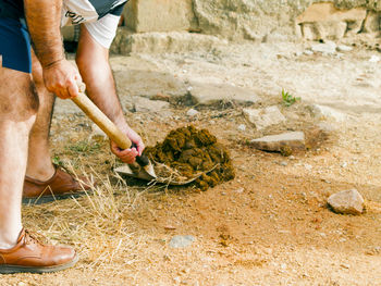 Low section of man working