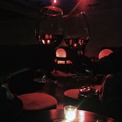 Close-up of illuminated red lights on table