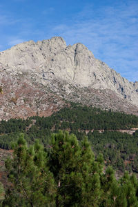 Scenic view of rocky mountains against sky