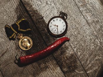 High angle view of clock on table