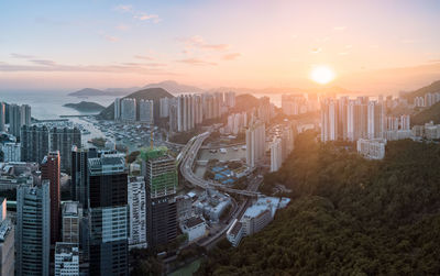 High angle view of cityscape against sky during sunset