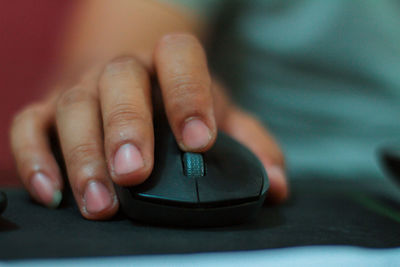 Close-up of person hand using smart phone