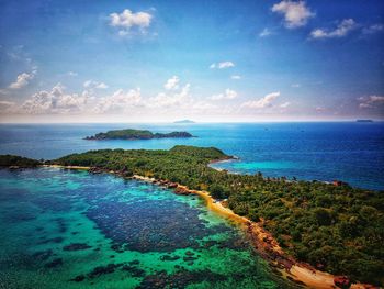 Scenic view of sea against blue sky