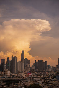 Cityscape against sky during sunset