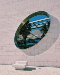 Reflection of building on wall