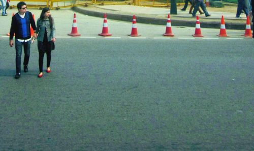 Low section of people on zebra crossing