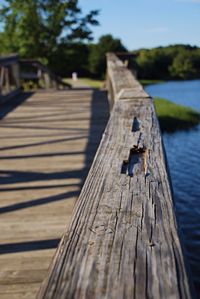 Close-up of wooden plank on pier