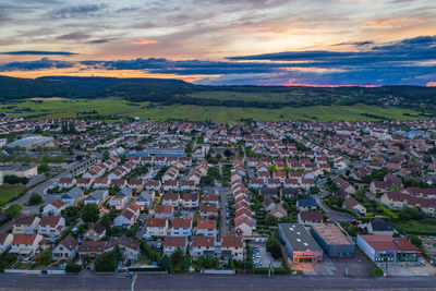 High angle view of townscape against sky at sunset