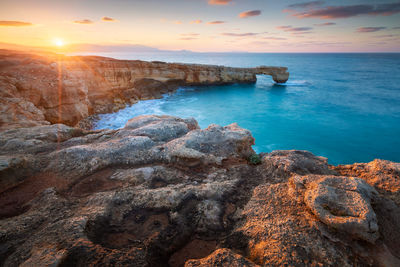 Limestone cliffs and a rock arch near lavris village in rethymno regio