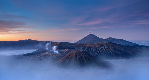 View of volcanic landscape during sunrise