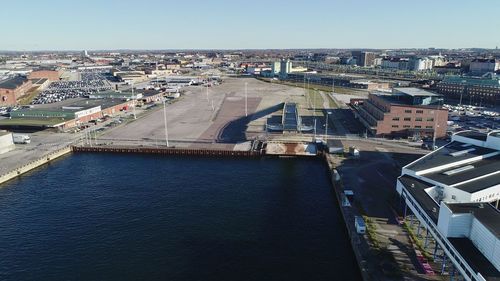 High angle view of river amidst buildings in city