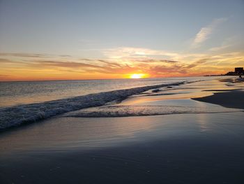 Scenic view of sea against sky during sunset