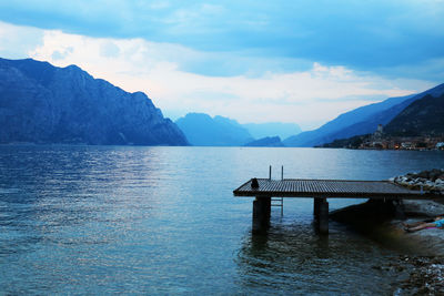 Pier over sea against sky