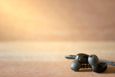 Close-up of camera on table