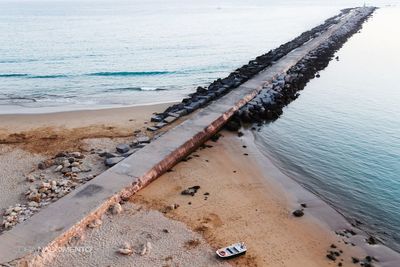 High angle view of pier at beach