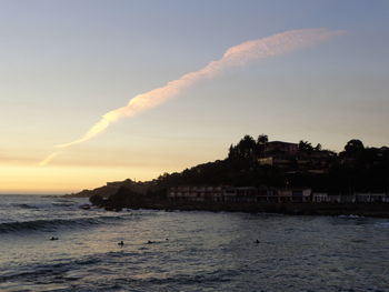 Scenic view of sea at sunset