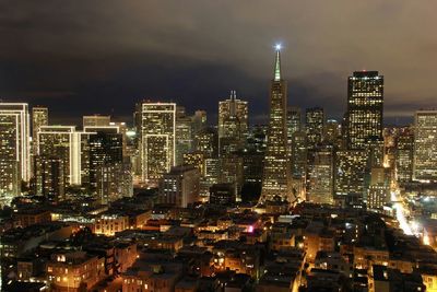 High angle view of illuminated cityscape at night