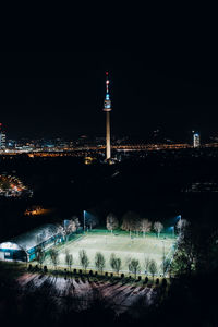 Illuminated buildings in city at night