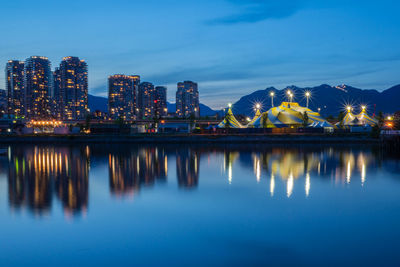 Illuminated cityscape at night