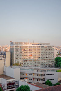 Buildings against clear sky