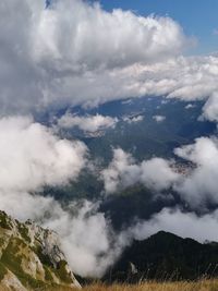 Low angle view of mountain range against sky