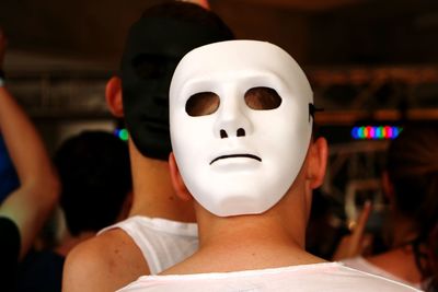 Close-up portrait of person wearing mask