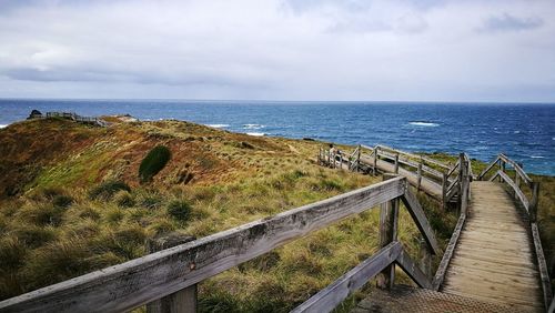 Walking down the broadwalk to enjoy the scenic view of sea