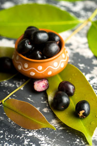 Close-up of black fruits on table