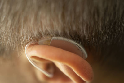 Close-up of man wearing hat