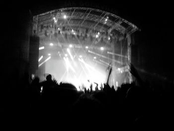 Rear view of people enjoying music concert