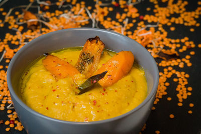 Close-up of red lentil soup in bowl