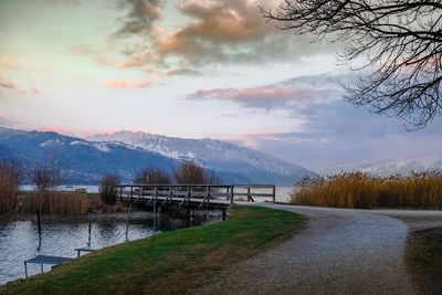 Scenic view of lake against sky during winter