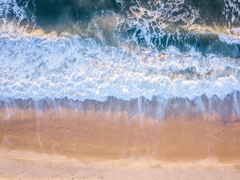 Close-up of water splashing on land