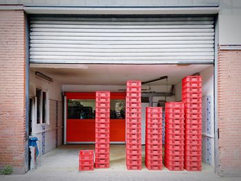 Stack of red crate in store