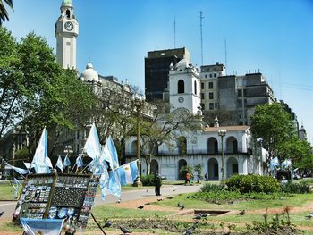 Argentinian flags in buenos aires cabildo against sky