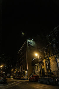 Illuminated street lights at night